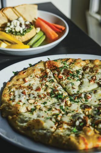 Goat cheese pizza and hummus plate at Park Cafe