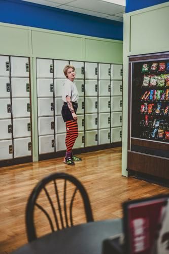 Color photo of Brennan Wedl standing next to the lockers at Donelson Strike and Spare