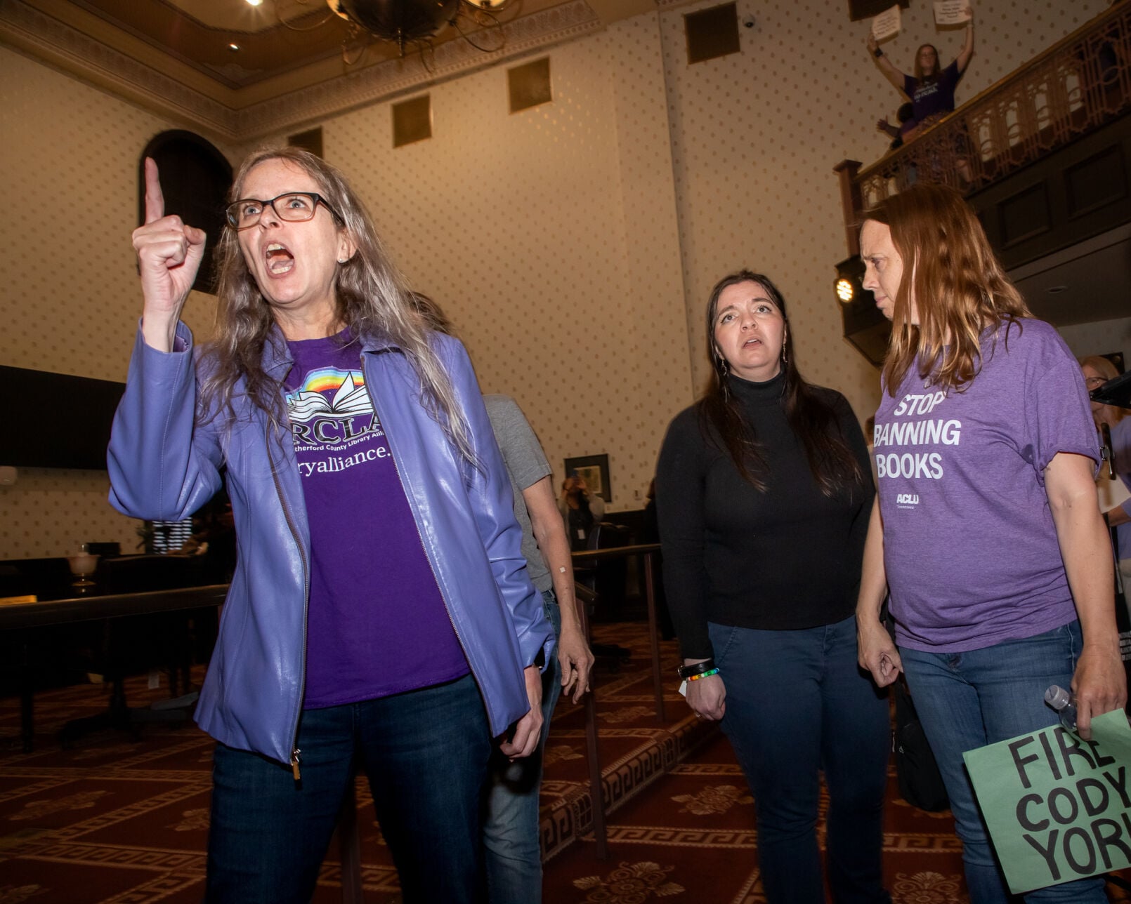 Rutherford County Library Alliance vice president Keri Lambert (left) confronts library board members and supporters of Cody York, March 30, 2026