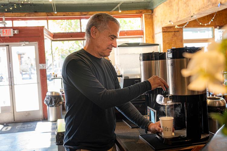 Bob Bernstein getting a cup of coffee at Fido
