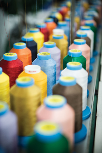 In a Smithville uniform factory, has Nashville found the missing threads for its local fashion industry?