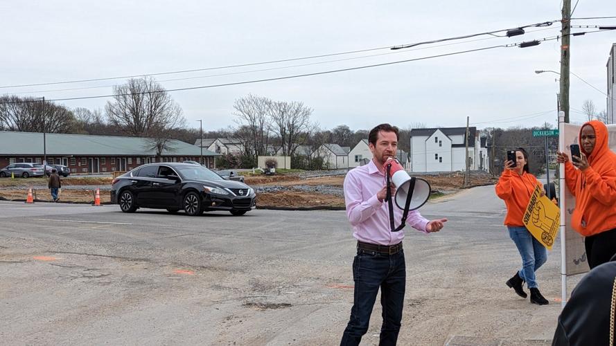 Labor advocates rally outside the construction site at 1330 Dickerson Pike