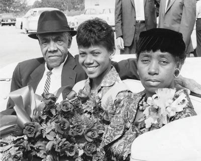 Wilma-Rudolph-and-parents-in-a-parade-in-Clarksville,-Tennessee,-after-the-Rome-Olympics,-1960-October-04.jpg