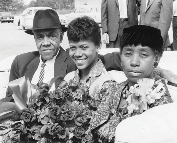Wilma-Rudolph-and-parents-in-a-parade-in-Clarksville,-Tennessee,-after-the-Rome-Olympics,-1960-October-04.jpg