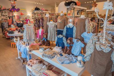 Racks of clothes on the display inside of Plaid Rabbit, which was voted Best Kids Clothing in Nashville