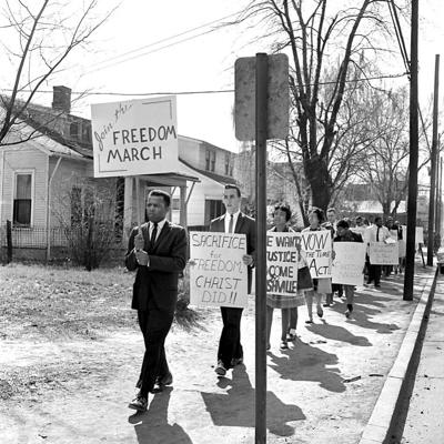 Freedom March on Jefferson Street in Nashville, led by John Lewis. March 23, 1963.