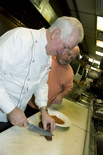 Jimmy Kelly's Owner Fulfills His Bet: Cooking His Heart Out at Rival Sunset Grill