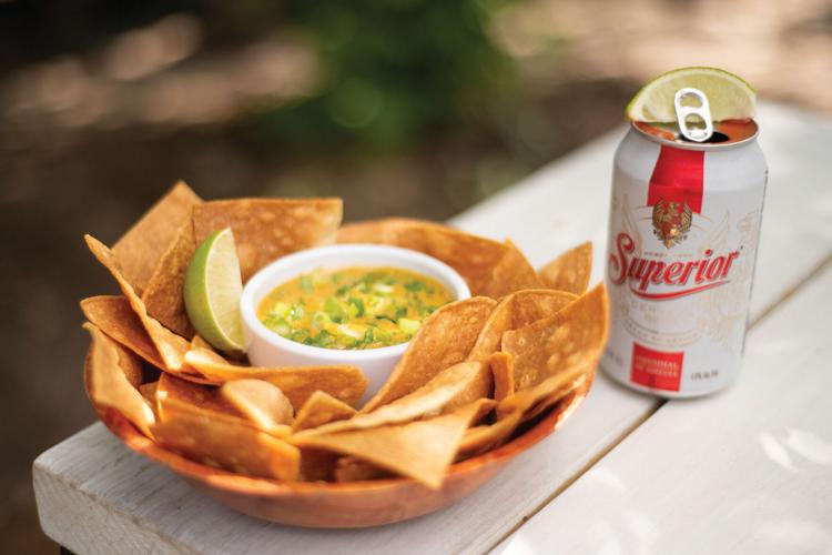 Superior Cerveza dressed with Cholula and lime