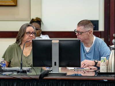 Kaye and Russell Maze exchange a glance during the hearing to overturn Russell's conviction for his infant son's death