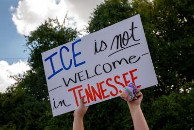A sign reading "ICE is not welcome in Tennessee"