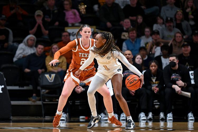 Vanderbilt's Mikayla Blakes drives toward the basket against Texas' Ashton Judd at Memorial Gymnasium, Feb. 12, 2026