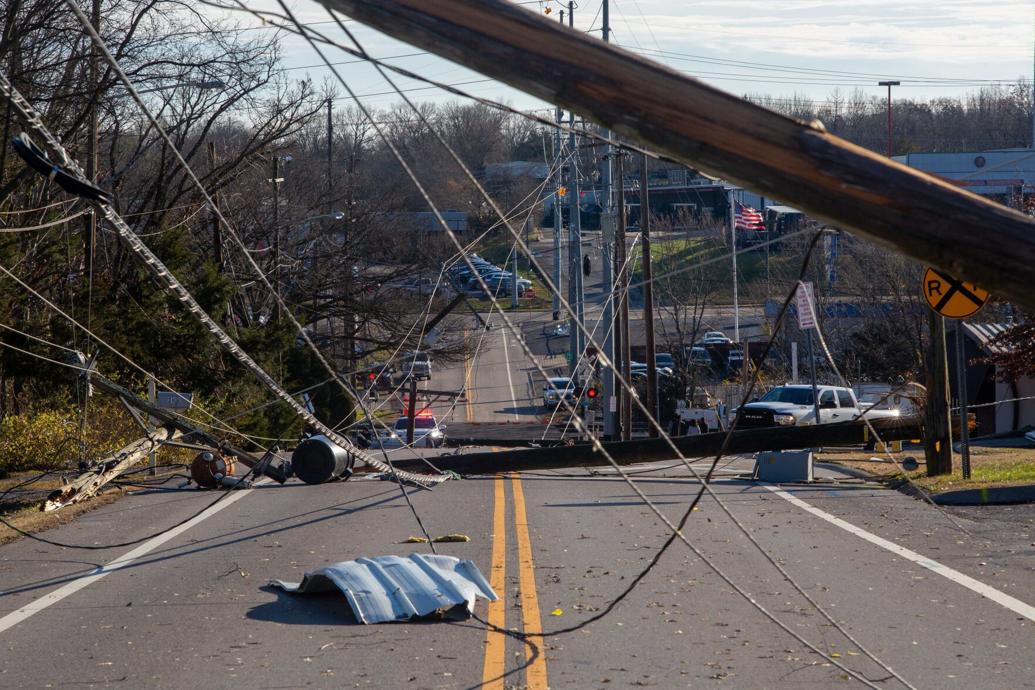 Utility poles, power lines and debris scattered across Madison's