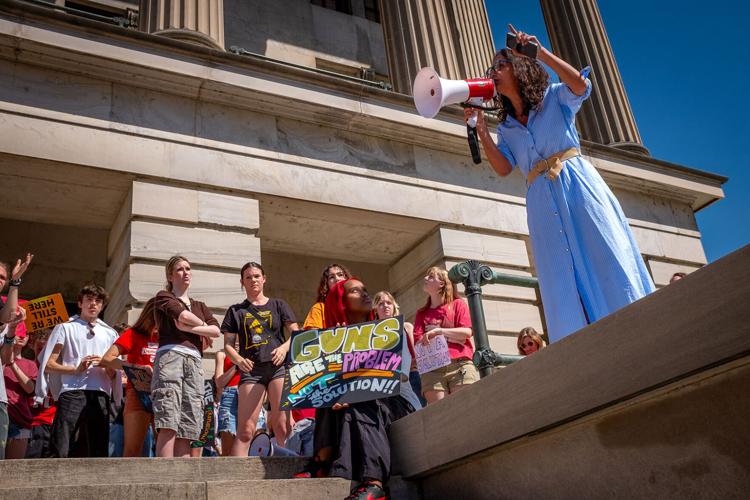 Maryam Abolfazli speaks at a rally against bill that would allow teachers to carry concealed firearms in schools