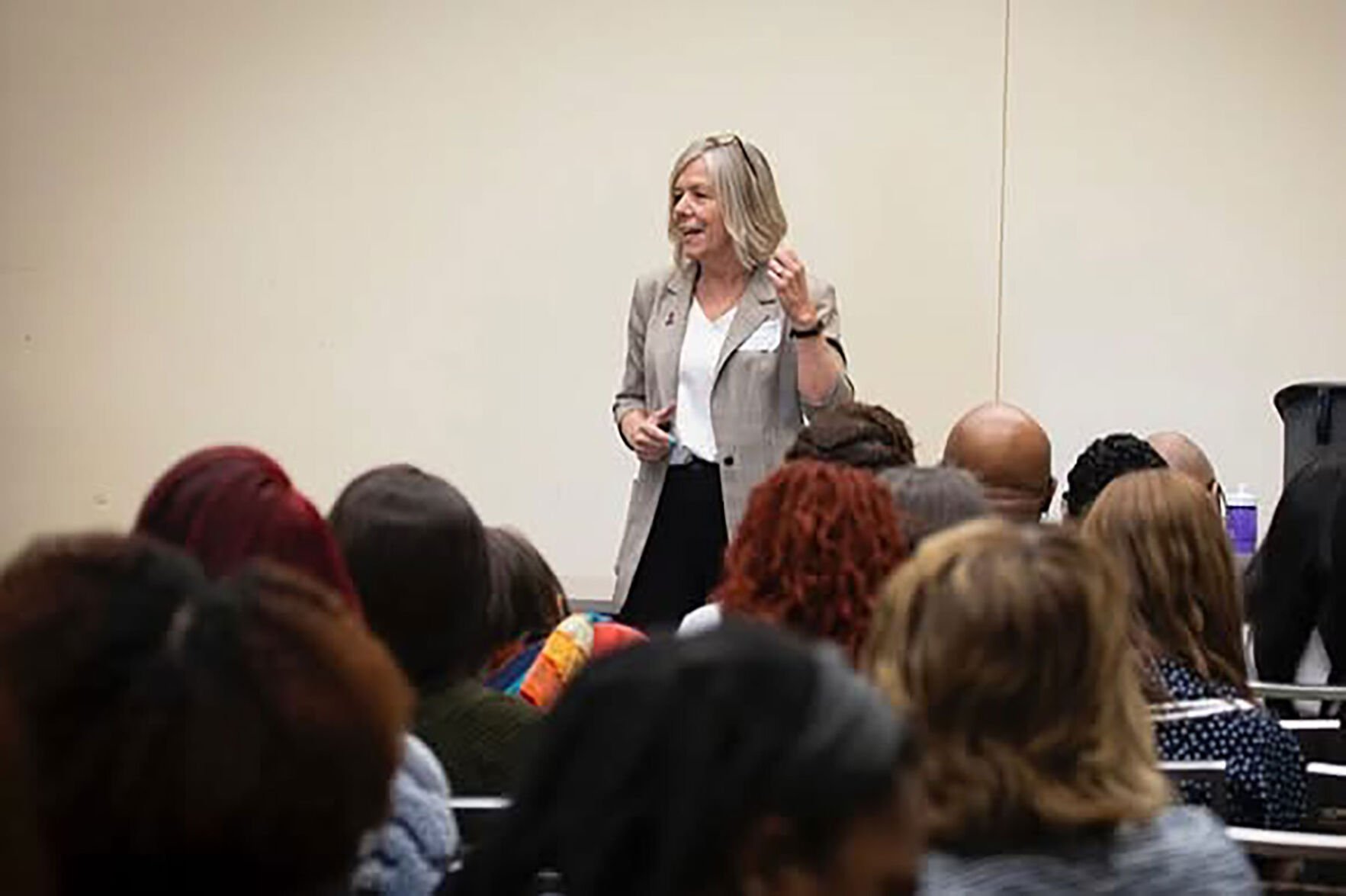 Kristen Gilliland speaks at a conference