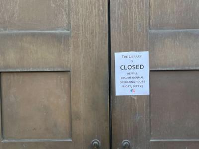 A sign posted on the doors of the Nashville Public Library, Sept. 22, 2022