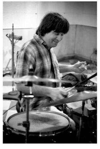 artist photo Mickey Grimm musician at drum kit