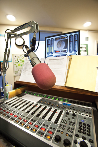 Lightning 100 thinks global, acts local — and bucks the trends of modern radio programming