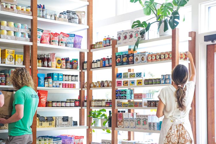 Shoppers peruse the shelves at Mama Bread