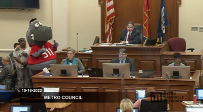 Rescue Rex attends a meeting of the Metro Council, Oct. 18, 2022