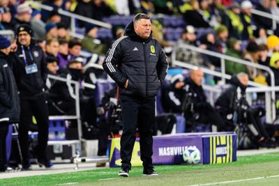 Nashville SC coach BJ Callaghan watches his team from the sidelines at Geodis park