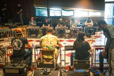 A circle of steel guitaritsts at the Nashville Steel Guitar Social Club
