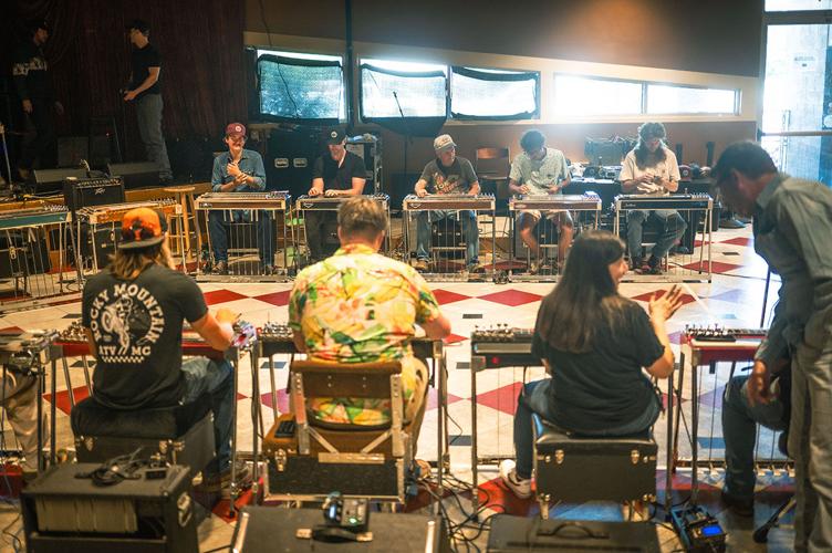 A circle of steel guitaritsts at the Nashville Steel Guitar Social Club