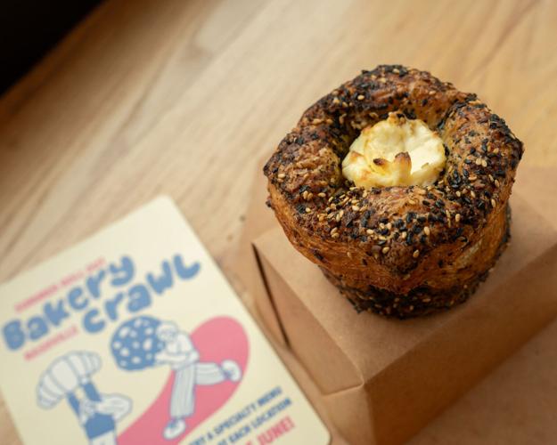 A furikake kouign-amann with butter and toasted sesame seeds