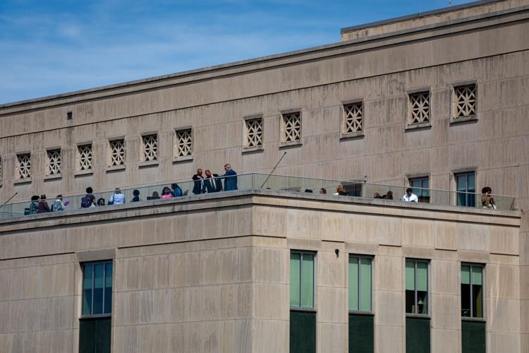 Lawmakers and staff enjoy a sunny day on the Cordell Hull State Office Building balcony, March 24, 2026