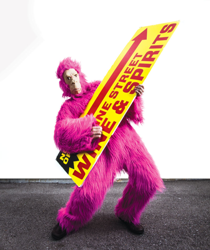 Ever wondered what it's like inside those sign-flipping mascot costumes? So did our reporter — until he went ape