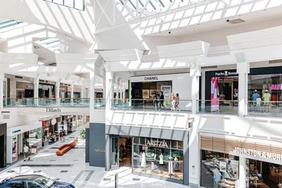 Looking over the balcony at 2 levels of stores at The Mall at Green Hills, the Nashville Scene’s 2026 Best Shopping Mall in Nashville