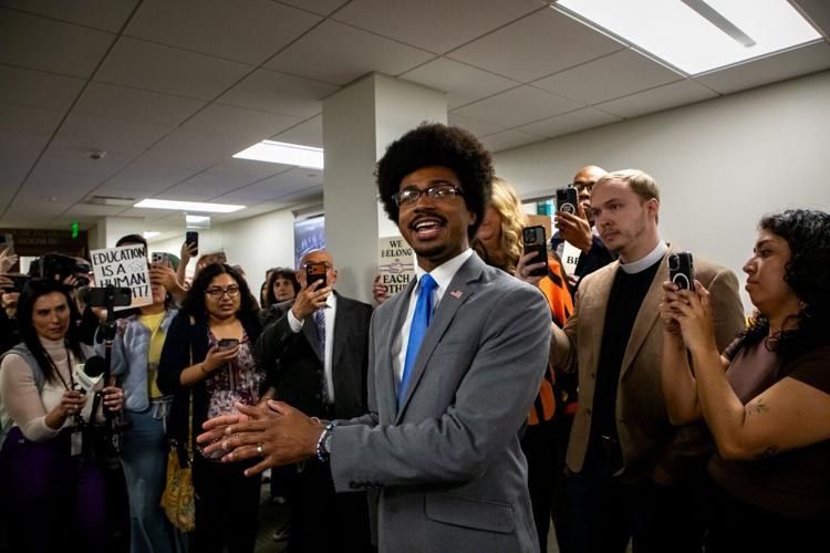 Rep. Justin Pearson gathers with protesters following the House Finance Ways and Means Committee’s approval of House Bill 793, March 4, 2026