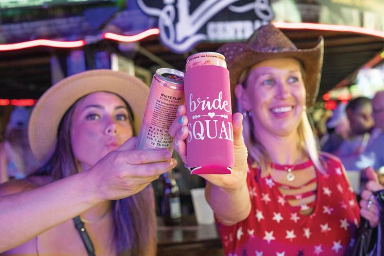 Broadway partiers toast with cans
