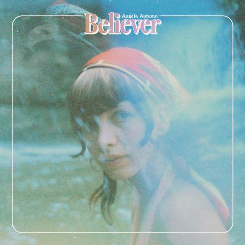 Album art for Angela Autumn’s 2026 release ‘Believer,’ featuring a blue-green-toned color photograph of the artist, standing in left profile but with her head turned to face the camera, washed out with the overlay of a photograph of a waterfall.