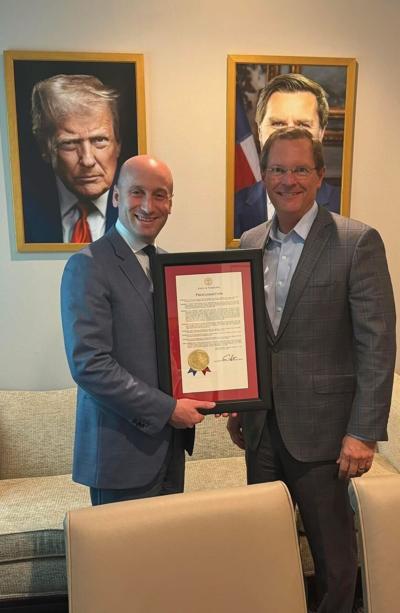 Speaker Cameron Sexton gives Trump adviser Stephen Miller a proclamation