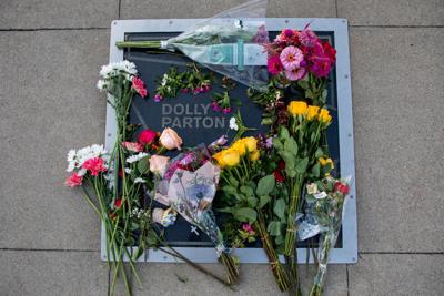 A memorial tribute to Dolly Parton at her star outside the Country Music Hall of Fame and Museum, photographed shortly after her death was announced on Aug. 25, 2026
