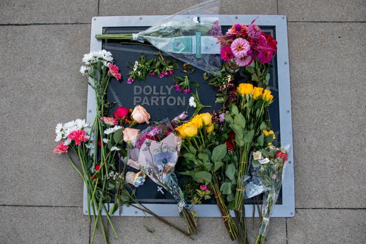 A memorial tribute to Dolly Parton at her star outside the Country Music Hall of Fame and Museum, photographed shortly after her death was announced on Aug. 25, 2026