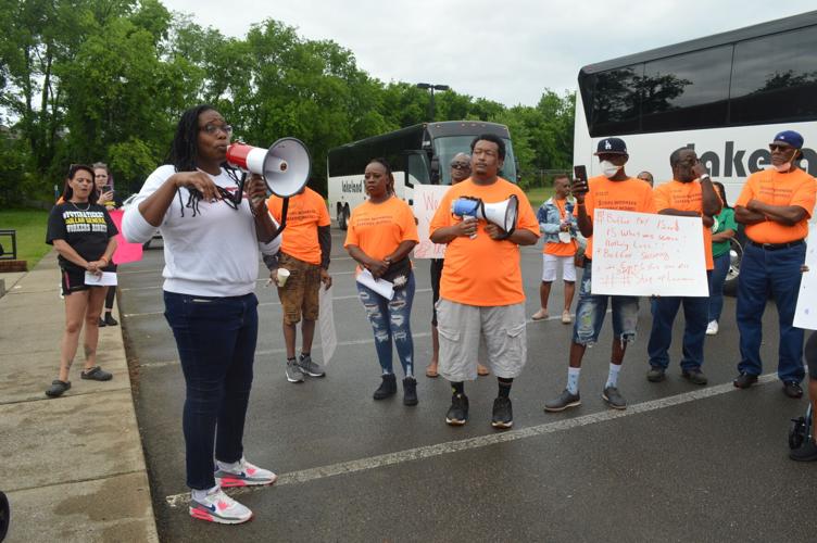 Odessa Kelly addresses demonstrators at Dollar General corporate headquarters
