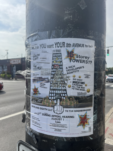 A flyer posted on a telephone pole near the site of a potential Eighth Avenue development