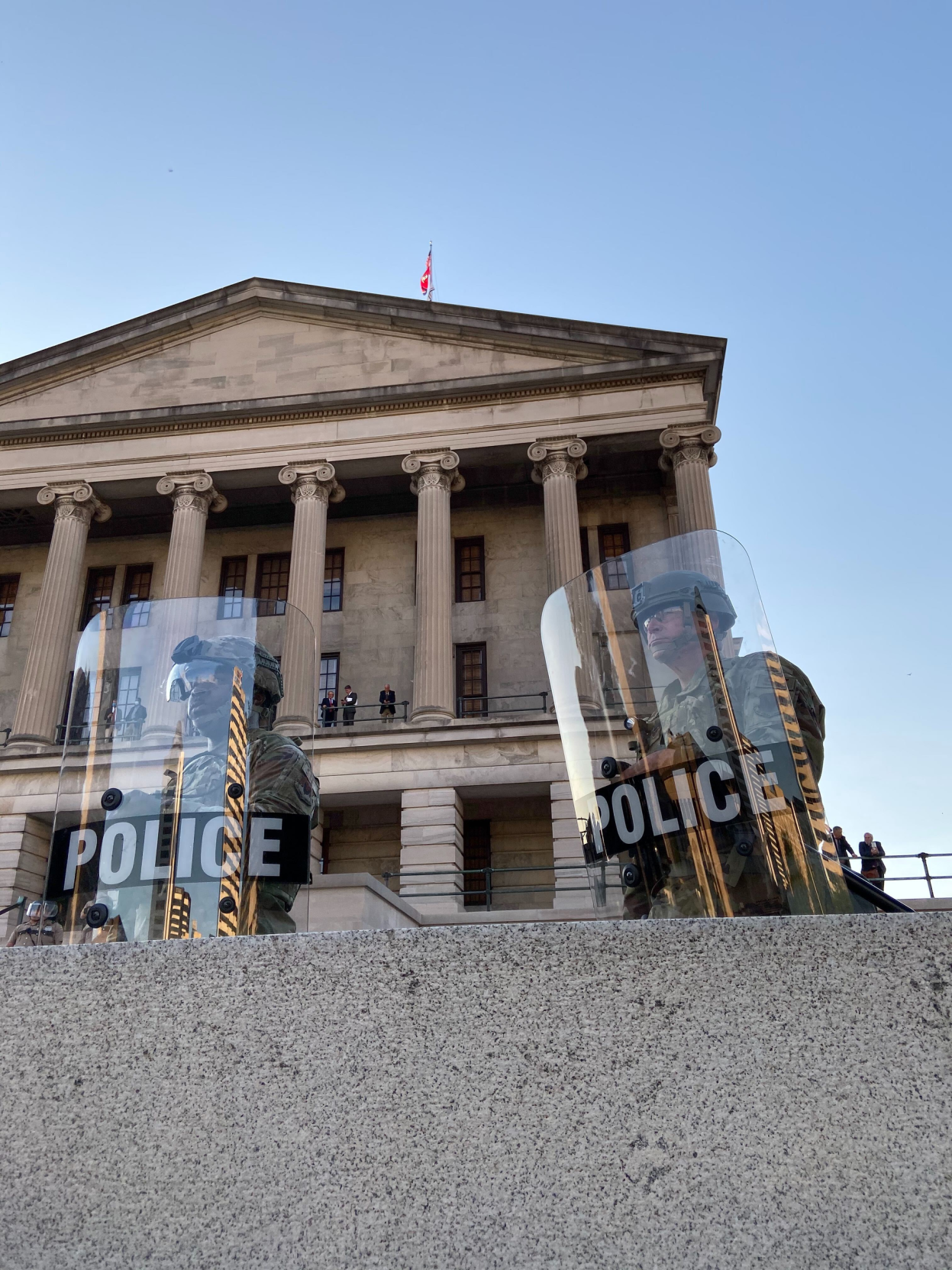 Peaceful Protesters Sing, Chant to Mass of National Guard Members