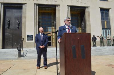 Attorneys Luke Ihnen (left) and Randy Spivey address reporters about the failed execution of Christa Pike