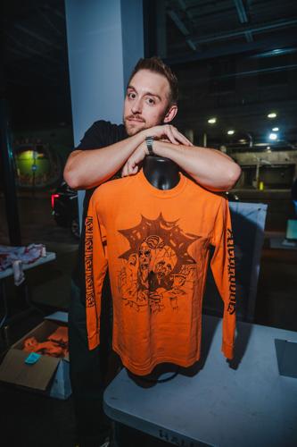 Handing out the preordered special commemorative T-shirts at the Belcourt for the 15th annual horror movie marathon 12 Hours of Terror, 10/17/2026.