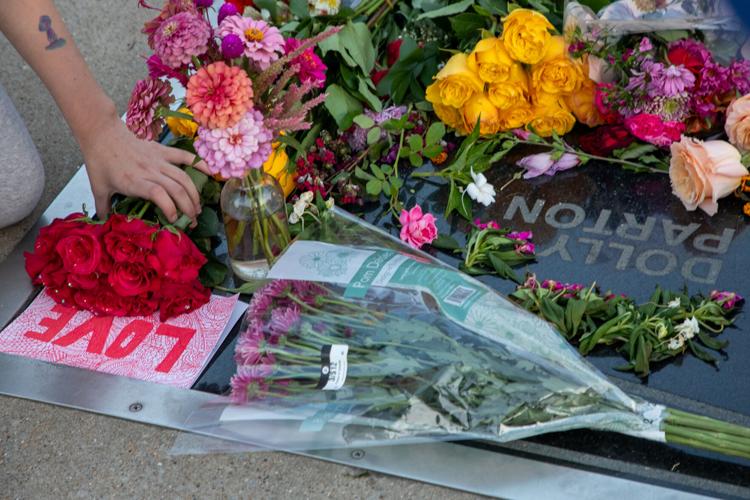 A memorial tribute to Dolly Parton at her star outside the Country Music Hall of Fame and Museum, photographed shortly after her death was announced on Aug. 25, 2026