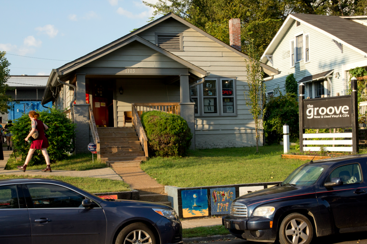 An exterior shot of the small house where The Groove operates its business