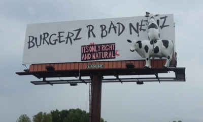 Photo of the Week: Local Chick-fil-A Billboard Graffiti'd With Frogs Reference