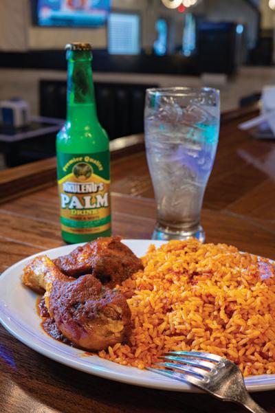 Stewed chicken and jollof rice Nicos Lounge 2023