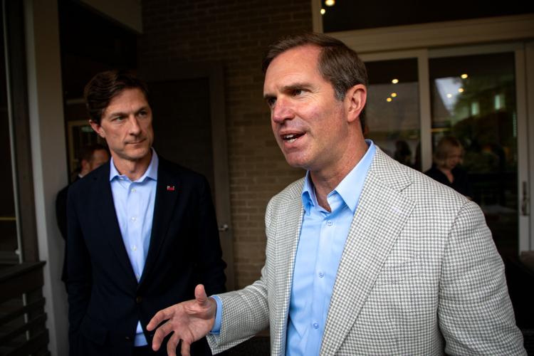 Chaz Molder (left) is joined by Kentucky Gov. Andy Beshear at a fundraising event in Nashville, Oct. 3, 2026