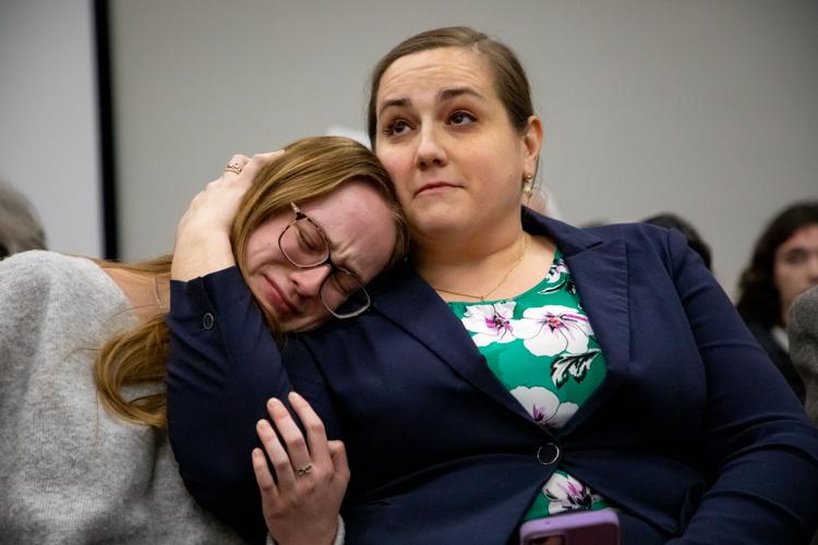 Mt. Juliet resident Sarah Payne comforts her daughter Charlotte during a Wilson County Commission meeting, Feb. 17, 2026