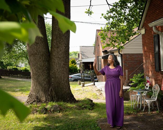 Erica Lanier outside her house