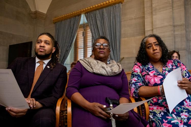Democratic Rep. Torrey Harris, House Minority Leader Karen Camper and Senate Minority Leader Raumesh Akbari observe a Republican press conference in the Capitol's Old Supreme Court Chambers, April 1, 2026