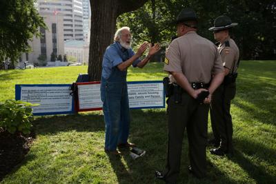 Karl Meyer speaks to state troopers